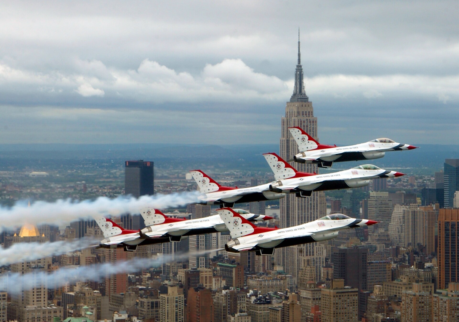 U.S. Air Force Thunderbirds F-16s flying in formation over New York City.